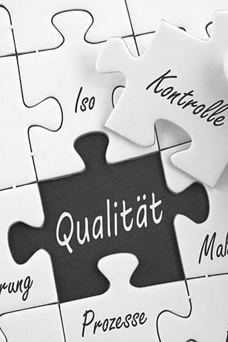 Puzzle mit dem Wort Qualität